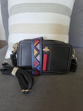 Black Crossbody Bag with Red Stripe and Colorful Woven Strap